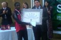 Kenyan Ednah Kimayo receives the women's race winner plaque at 2012 Sfax Marathon / Photo: Babatunde Eludini/AthleticsAfrica