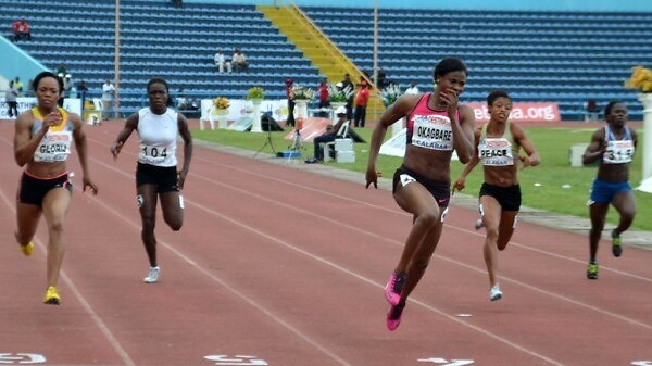 Blessing Okagbare winning the 100m race in Calabar 2013 / Photo: @Shengolpixs