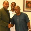 Solomon Ogba in a handshake with Eric Campbell while Commodore Omatseye Nesiama watches / Photo credit: Gongnews.net