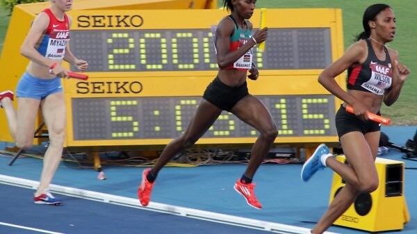 Kenya’s women’s 4x800m star Janeth Jepkosgei on the way to setting the World Record at Nassau 2014 / Photos credit: Derek Smith