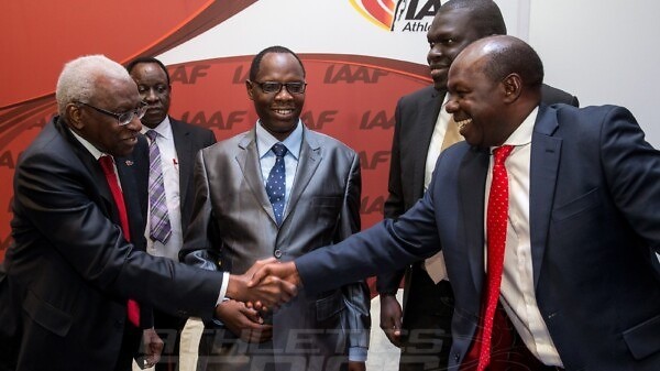 IAAF President, Lamine Diack congratulates the Ugandan delegation led by Hon. Charles Bakkabulindi, Honorary State Minister of Education and Sport / Photo credit: IAAF / Philippe Fitte
