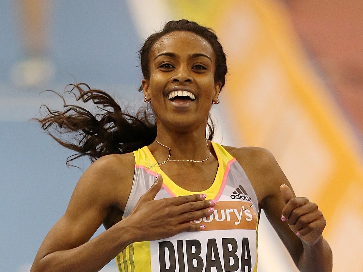 Genzebe Dibaba celebrates winning the women's two-mile contest at Birmingham's indoor grand prix