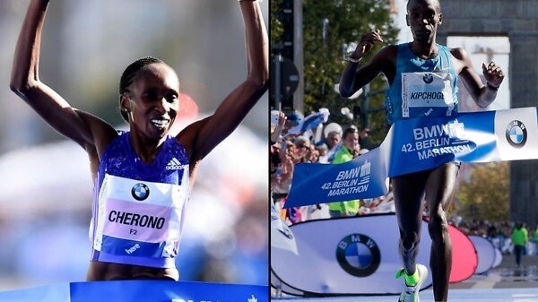 Eliud Kipchoge with his insoles flapping about and Gladys Cherono - men's and women's race winners at the 42nd BMW Berlin Marathon.