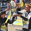 Ethiopian Lemi Berhanu Hayle edged defending champion Lelisa Desisa while Atsede Baysa beat a world-class field to win the 120th Boston Marathon