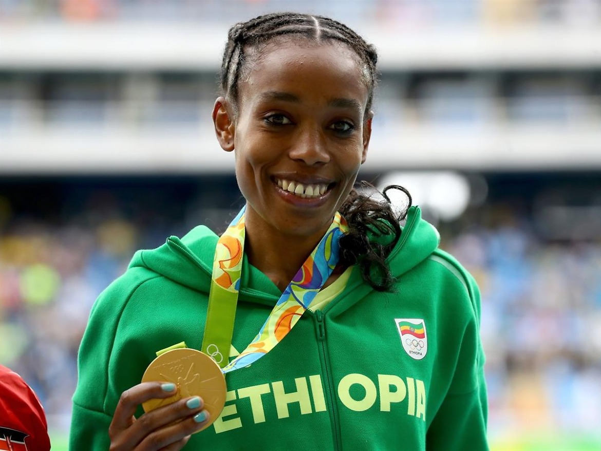 Ethiopia's Almaz Ayana with her women's 10000m gold medal on Day 1 of Athletics competition at Rio 2016 / Photo credit: Getty Images / IAAF