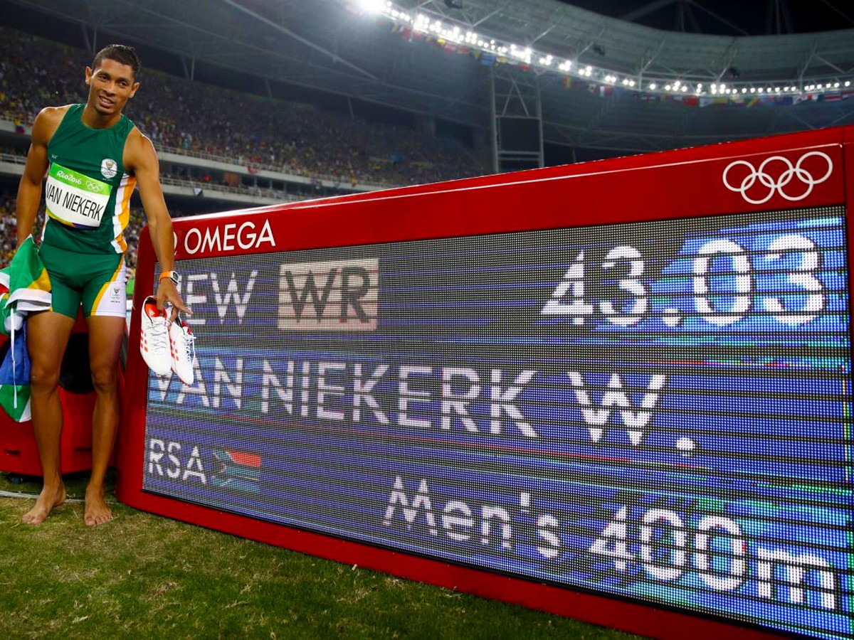 Wayde van Niekerk of South Africa celebrates after breaking the men’s 400m world record in 43.03 secs in Rio 2016 / Photo Credit: Getty Images