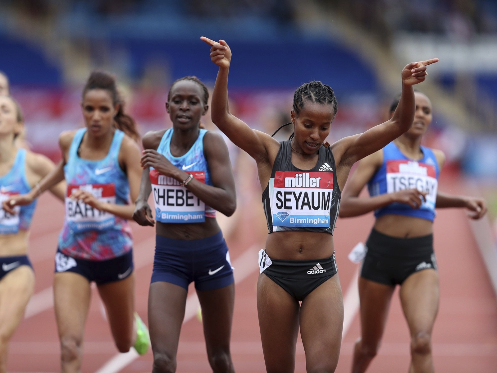Ethiopa's Dawit Seyaum celebrates winning the Women's 1500m during the Muller Grand Prix at the Alexandra Stadium, Birmingham