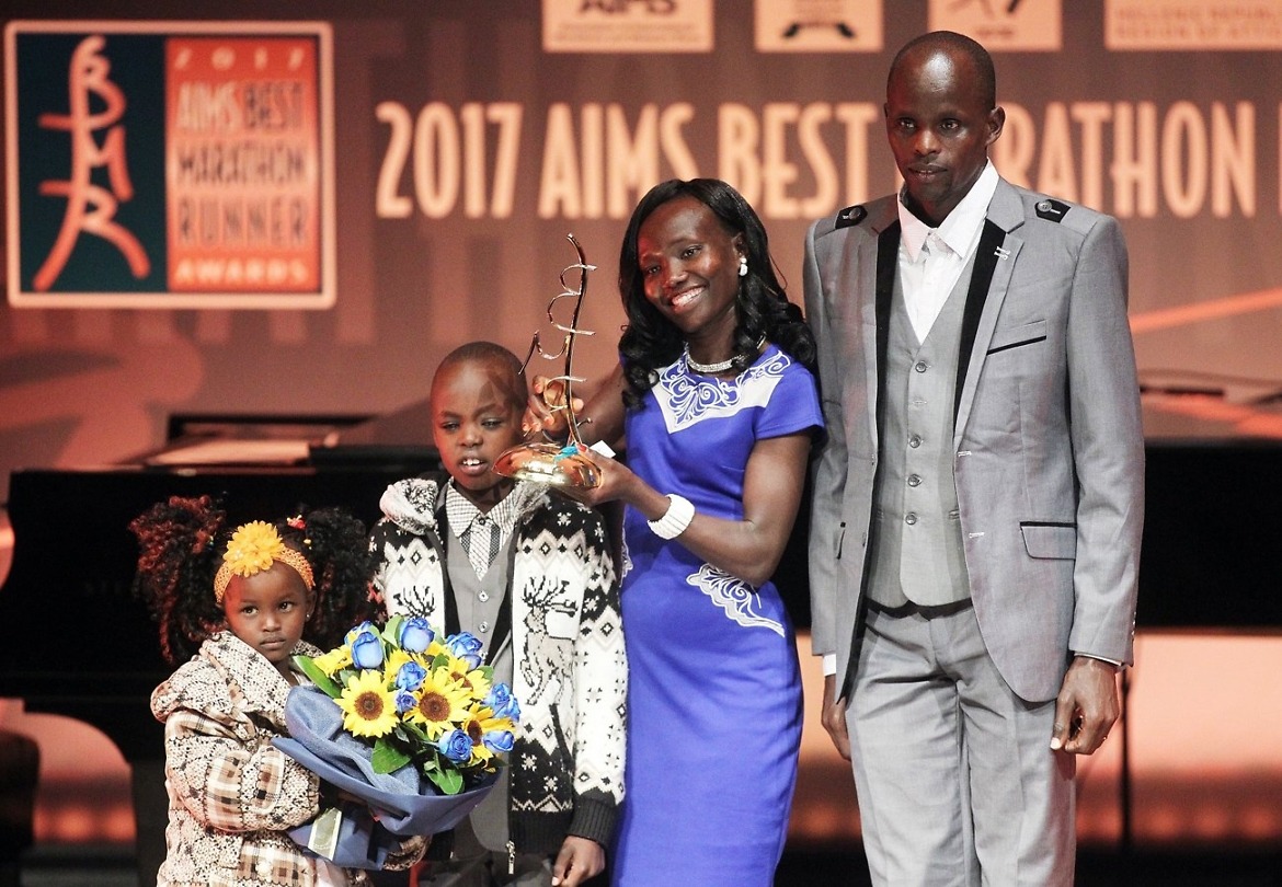 Mary Keitany with her family during the gala in Athens (photo credit: SEGAS-AMA)