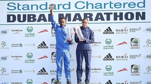 Ethiopia’s Mosinet Geremew and Roza Dereje winning with course records to take the men's and women's titles at the 2018 Standard Chartered Dubai Marathon / Photo Credit: Dubai Marathon Office