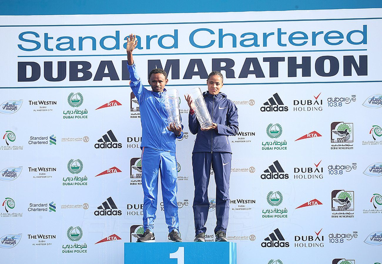Ethiopia’s Mosinet Geremew and Roza Dereje winning with course records to take the men's and women's titles at the 2018 Standard Chartered Dubai Marathon / Photo Credit: Dubai Marathon Office