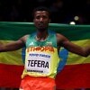 Gold Medallist, Samuel Tefera of Ethopia celebrates winning the Mens 1500 Metres Final during the IAAF World Indoor Championships on Day Four at Arena Birmingham on March 4, 2018 in Birmingham, England. (Photo by Michael Steele/Getty Images for IAAF)