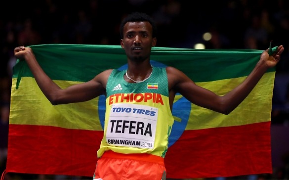 Gold Medallist, Samuel Tefera of Ethopia celebrates winning the Mens 1500 Metres Final during the IAAF World Indoor Championships on Day Four at Arena Birmingham on March 4, 2018 in Birmingham, England. (Photo by Michael Steele/Getty Images for IAAF)