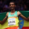 Gold Medallist, Yomif Kejelcha of Ethopia celebrates after the Mens 3000 Metres Final during the IAAF World Indoor Championships on Day Four at Arena Birmingham on March 4, 2018 in Birmingham, England. (Photo by Michael Steele/Getty Images for IAAF)