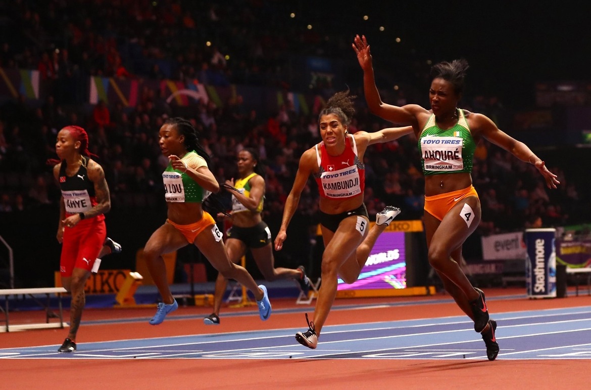 Murielle Ahoure (R) of Cote D'Ivoire wins the 60 Metres Womens Final during the IAAF World Indoor Championships on Day Two at Arena Birmingham on March 2, 2018 in Birmingham, England. Photo by Michael Steele/Getty Images for IAAF
