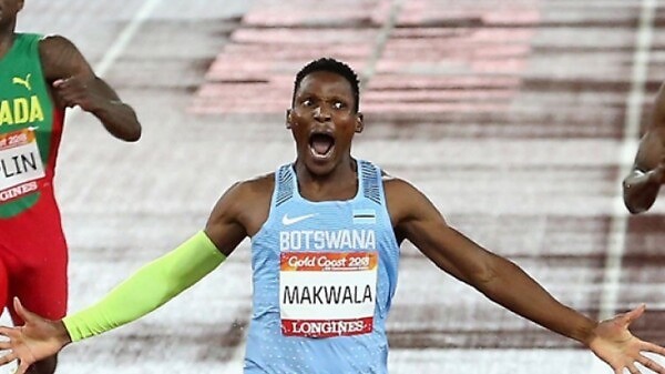 The gold medallist Isaac Makwala celebrates after the men's 400m final / Photo Credit: Getty