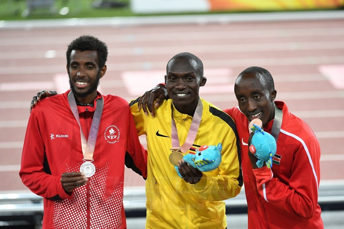 Uganda's Joshua Kiprui Cheptegei and Kenya's Rodgers Kwemoi at Gold Coast 2018 / Photo Credit: Norman Katende