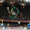 Luvo Manyonga of South Africa flies through the air in the men’s long jump final. Credit: Cameron Spencer/Getty Images