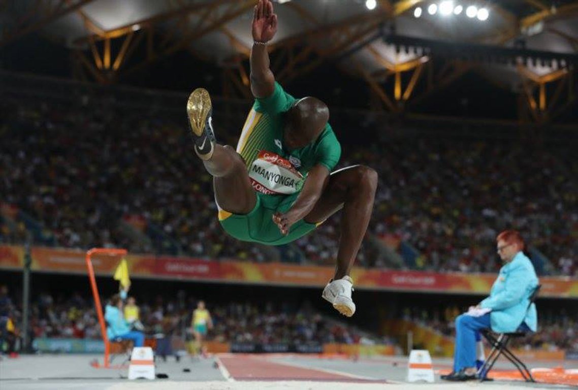 Luvo Manyonga of South Africa flies through the air in the men’s long jump final. Credit: Cameron Spencer/Getty Images