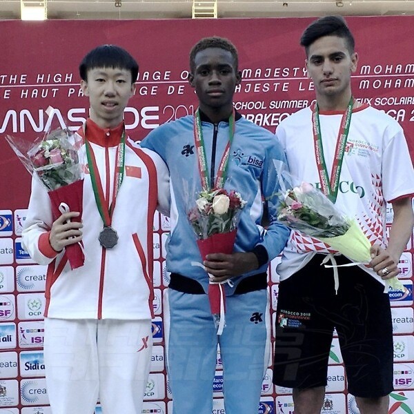 Botswana's Bernard Olesite (C) with Sheng Luo of China and Mehdi Sefrani of Morocco on the podium after the Boys 400m medal presentation at Gymnasiade 2018 in Marrakech / Photo Credit: Yomi Omogbeja