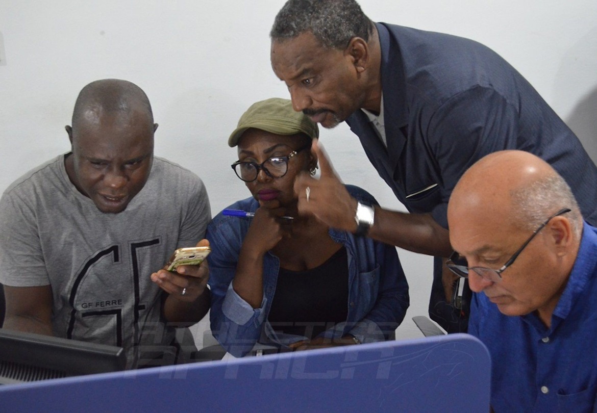 Participants for the Delegates Registration Meeting for CAA Asaba 2018 check their details at the Stephen Keshi Stadium in Asaba on Tuesday 10 July, 2018 / Photo Credit: Asaba 2018 LOC
