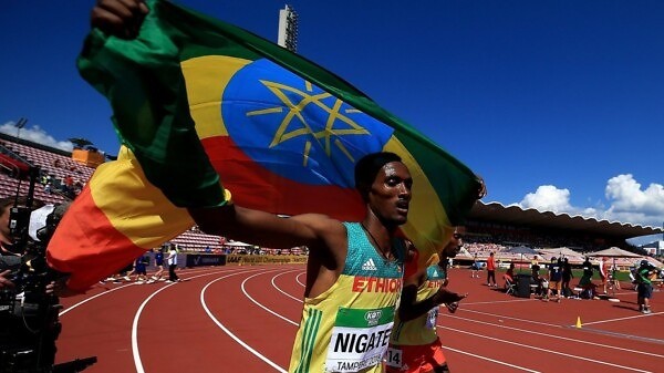 Takele Nigate of Ethiopia celebrates winning the men's 3000m steeplechase at the IAAF World U20 Championships Tampere 2018 / Photo Credit: Getty for the IAAF