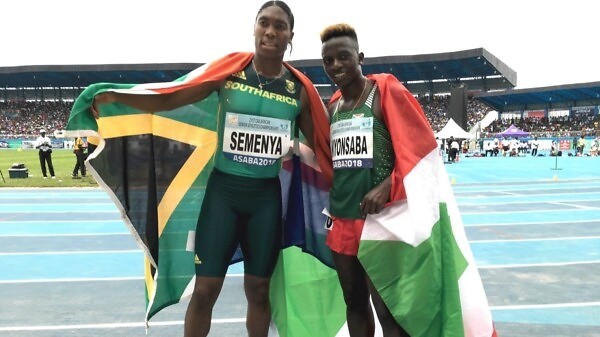 South Africa's Caster Semenya and Francine Burundi after the taking gold and silver in women's 800m at the 2018 African Senior Championships in Asaba / Photo credit: Yomi Omogbeja
