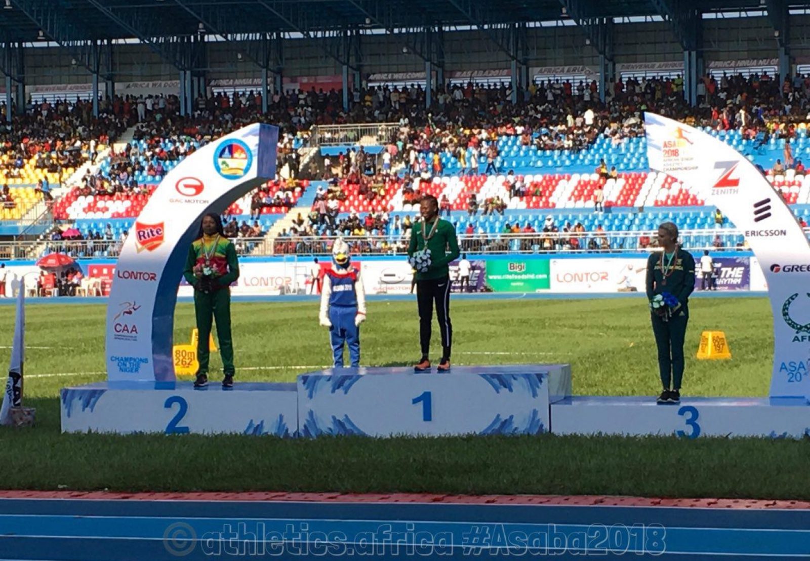 Medal presentation to Ese Brume and other medallists - women's Long Jump - Asaba 2018 / Photo credit: Yomi Omogbeja for Athletics Africa