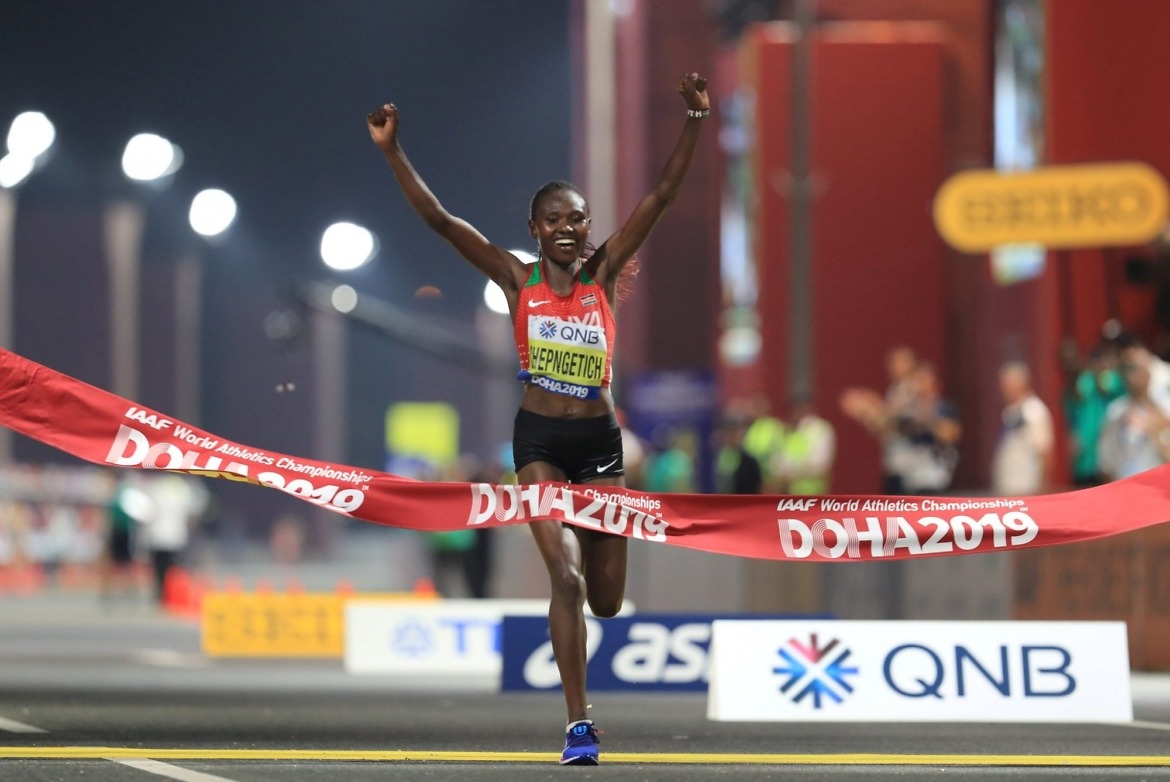Kenya's Ruth Chepngetich celebrates winning the first gold medal of the 2019 IAAF World Championships in Doha / Photo credit: ©Getty Images