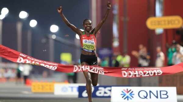 Kenya's Ruth Chepngetich celebrates winning the first gold medal of the 2019 IAAF World Championships in Doha / Photo credit: ©Getty Images