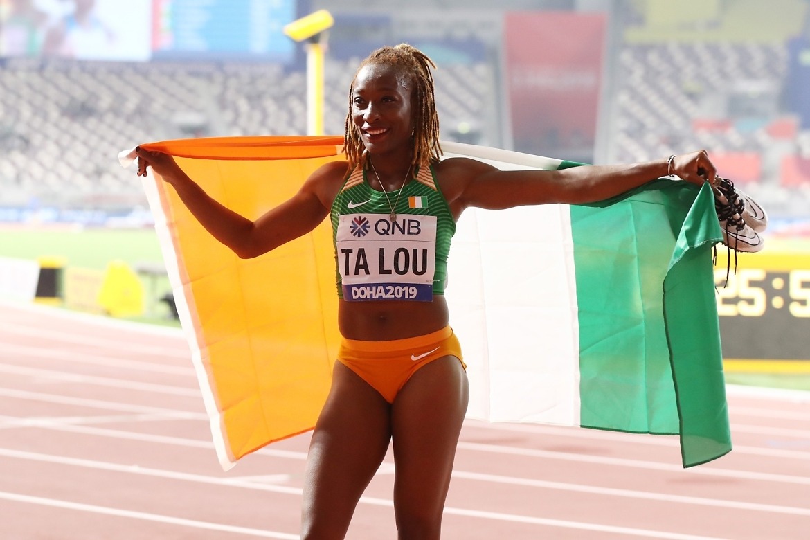 Marie-Josée Ta Lou of the Ivory Coast, bronze, celebrates after the Women's 100 Metres final during day three of 17th IAAF World Athletics Championships Doha 2019 at Khalifa International Stadium on September 29, 2019 in Doha, Qatar. (Photo by Alexander Hassenstein/Getty Images for IAAF )