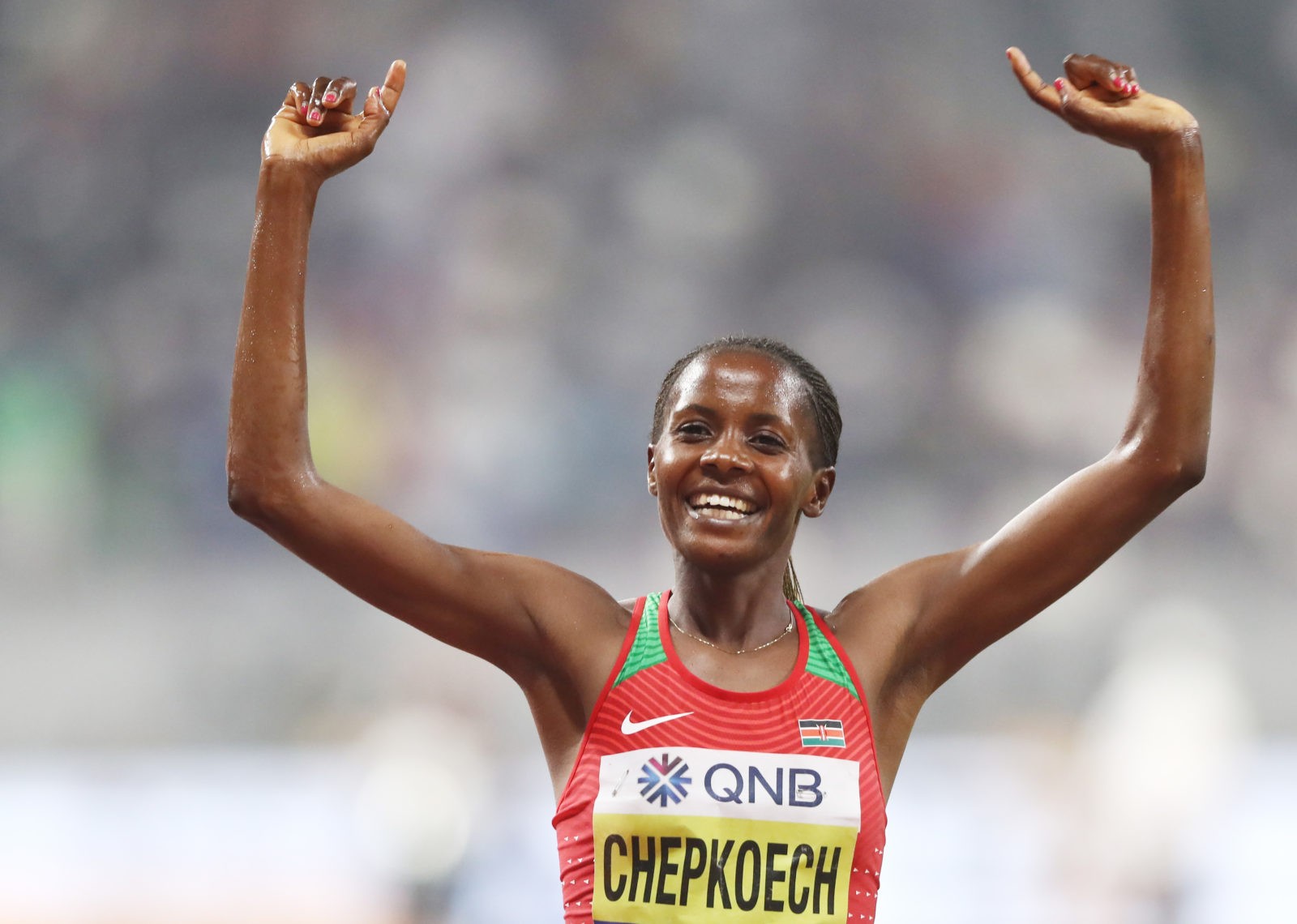 Beatrice Chepkoech of Kenya celebrates winning gold in the Women's 3000 metres Steeplechase final during day four of 17th IAAF World Athletics Championships Doha 2019 at Khalifa International Stadium on September 30, 2019 in Doha, Qatar. (Photo by Alexander Hassenstein/Getty Images for IAAF)