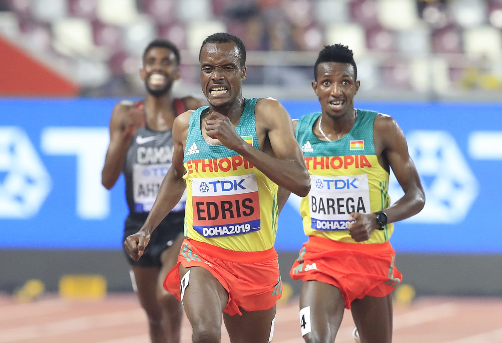 Gold medalist Muktar Edris of Ethiopia and silver medalist Selemon Barega of Ethiopia compete in the Men's 5000 metres final during day four of 17th IAAF World Athletics Championships Doha 2019 at Khalifa International Stadium on September 30, 2019 in Doha, Qatar. (Photo by Andy Lyons/Getty Images for IAAF)