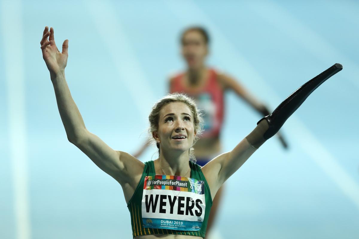 Anrune Weyers celebrates South Africa's first gold medal at Dubai 2019 in the women's 400m T47 ⒸBryn Lennon/Getty Images