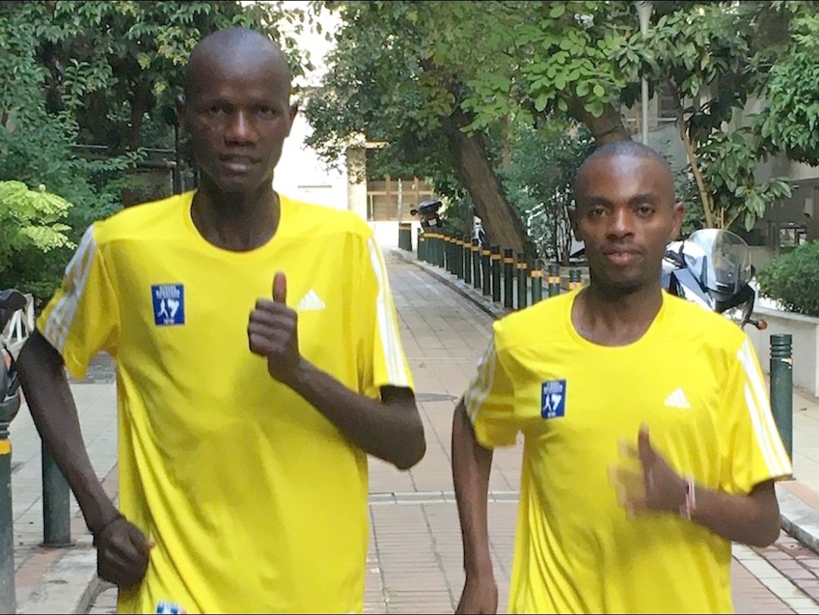 Kenyan runners Rhonzas Kilimo and Daniel Muteti (right) in Athens / Photo credit: AMA / Race News Service.