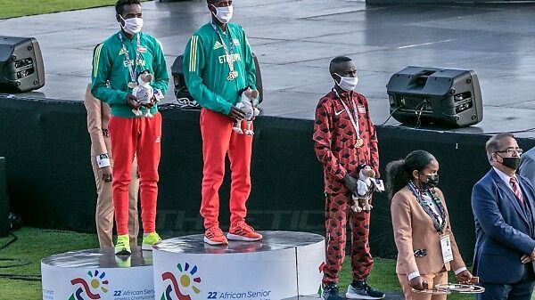 Ethiopians dominate the men's 10000m podium with Mogos Tiumay taking the gold ahead of Chimdesa Debela. Kenya's Abraham Longosiwa settles for the bronze medal / Photo credit: Yaaseen Kahaar for AthleticsAfrica.