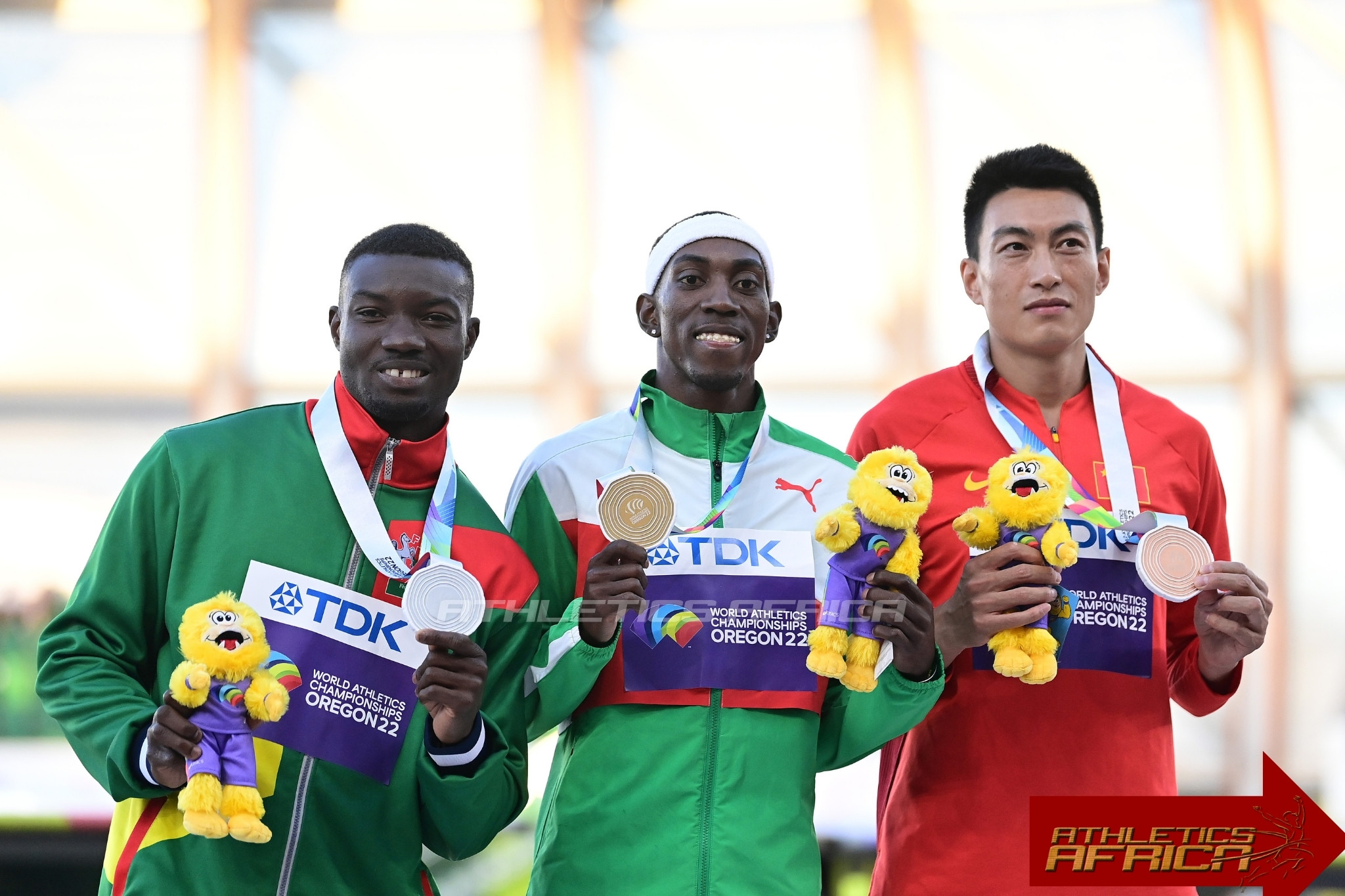 Silver medalist Hugues Fabrice Zango of Team Burkina Faso, gold medalist Pedro Pichardo of Team Portugal and bronze medalist Yaming Zhu of Team China pose during the medal ceremony for the Men's Triple Jump Final on day nine of the World Athletics Championships Oregon22 at Hayward Field on July 23, 2022 in Eugene, Oregon. (Photo by Hannah Peters/Getty Images for World Athletics)