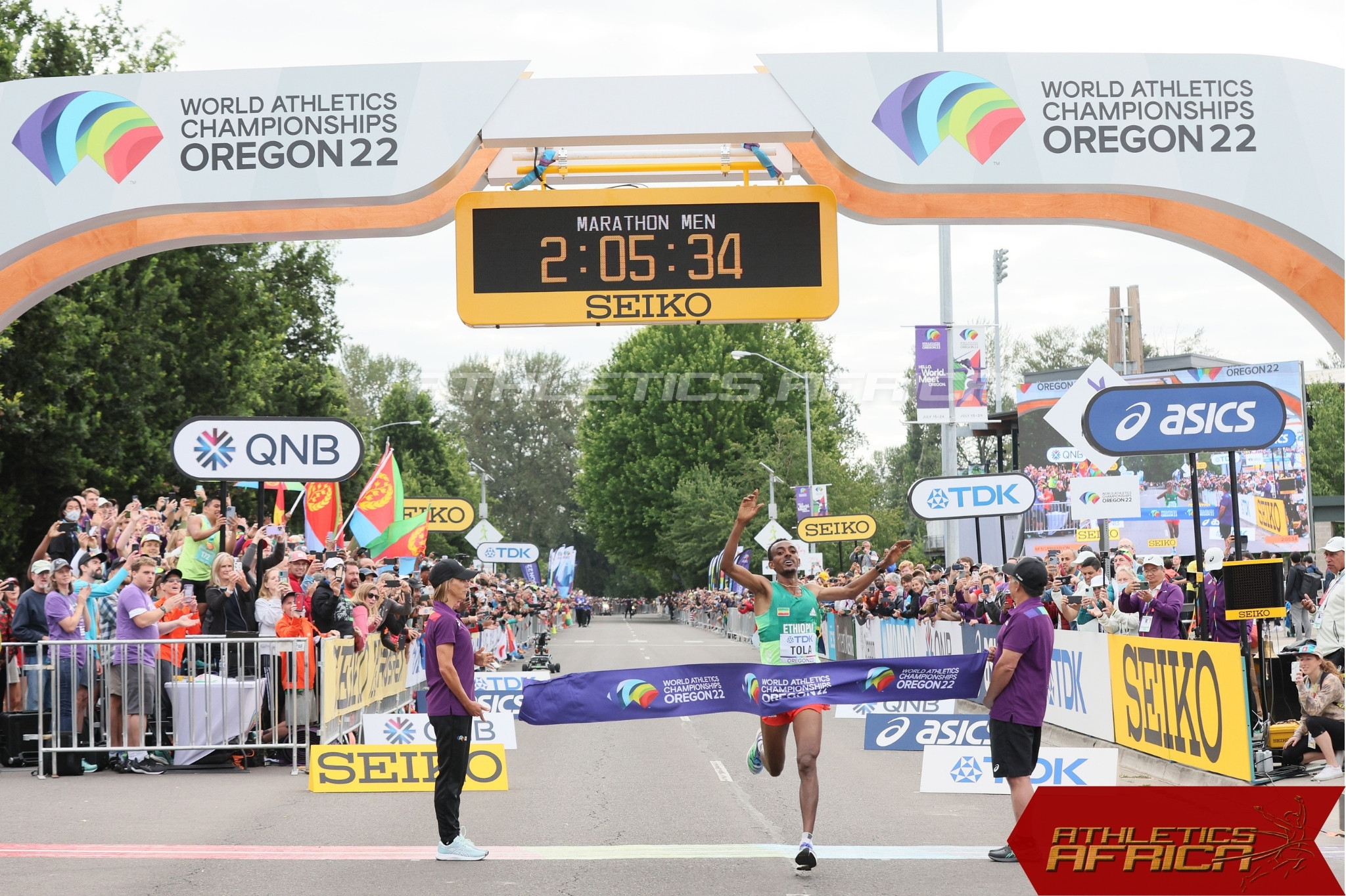 Tamirat Tola owns the field as he crosses the line in 2:05:36, taking gold and smashing the 13 year-old world championship marathon record / Photo credit: Getty Images for World Athletics