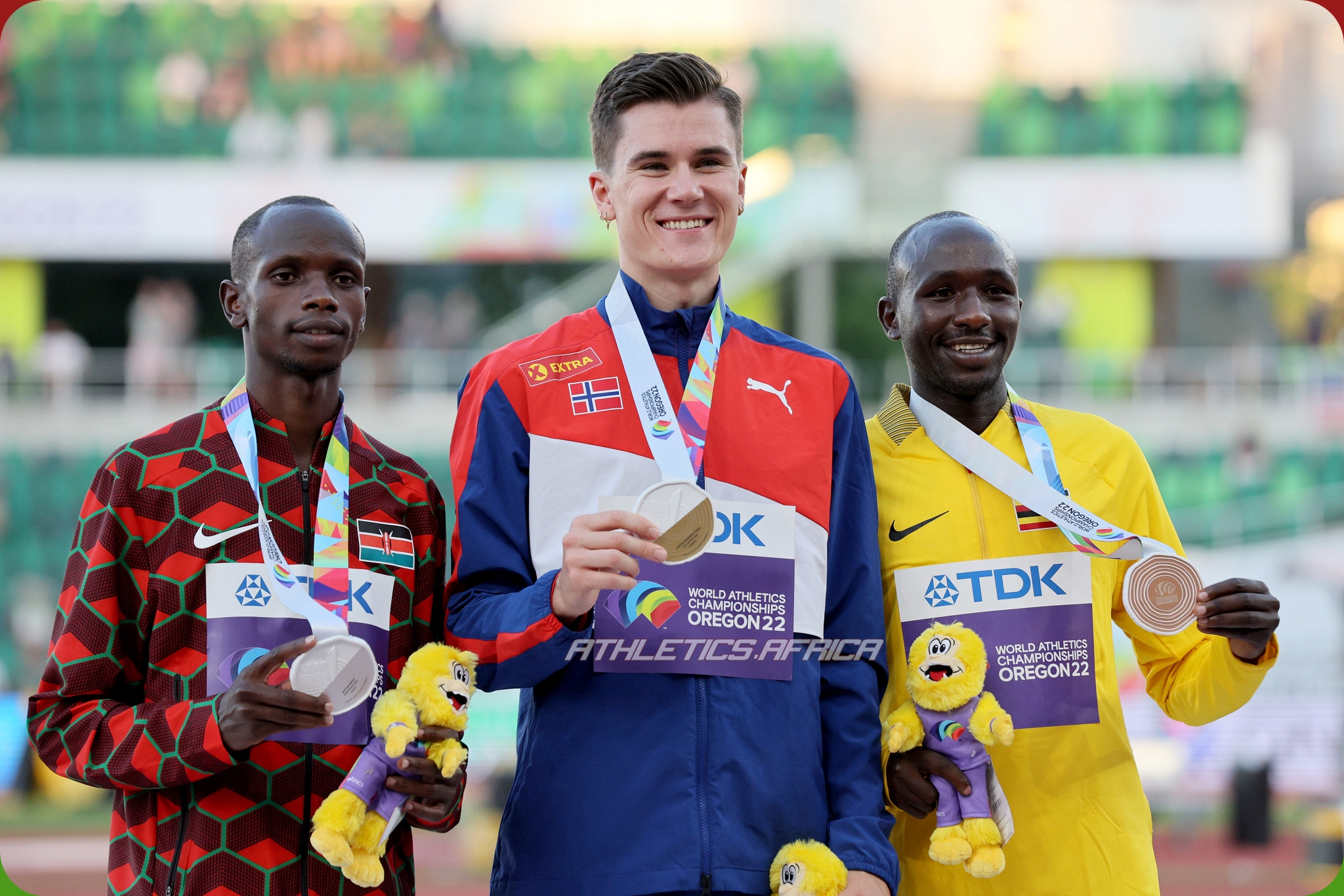 Silver medalist Jacob Krop of Team Kenya, gold medalist Jakob Ingebrigtsen of Team Norway, and bronze medalist Oscar Chelimo of Team Uganda pose during the medal ceremony for the Men's 5000m Final on day ten of the World Athletics Championships Oregon22 at Hayward Field on July 24, 2022 in Eugene, Oregon. (Photo by Andy Lyons/Getty Images for World Athletics)
