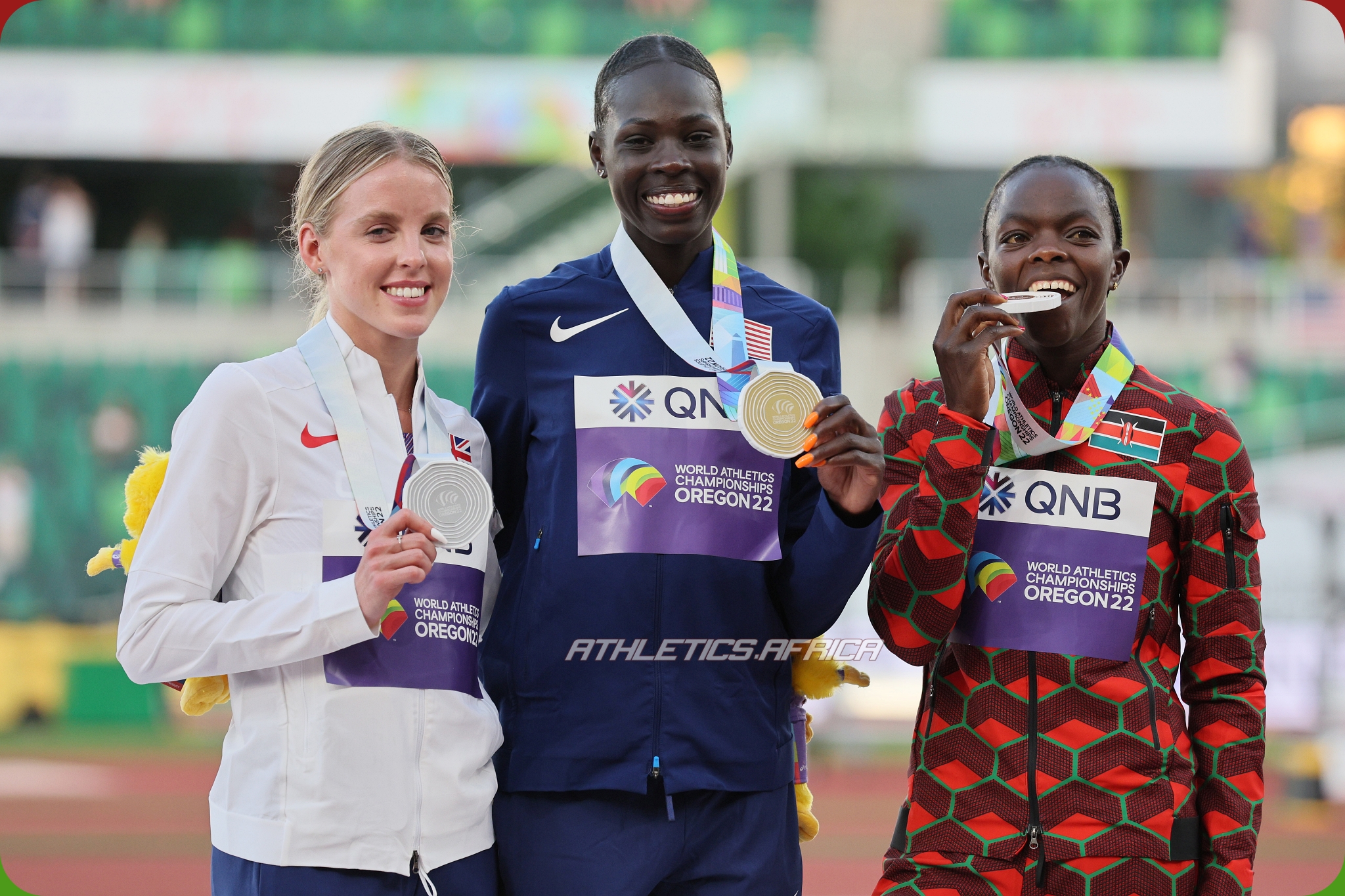 Silver medalist Keely Hodgkinson of Team Great Britain, gold medalist Athing Mu of Team United States, and bronze medalist Mary Moraa of Team Kenya pose during the medal ceremony for the Women's 800m on day ten of the World Athletics Championships Oregon22 at Hayward Field on July 24, 2022 in Eugene, Oregon. (Photo by Andy Lyons/Getty Images for World Athletics)