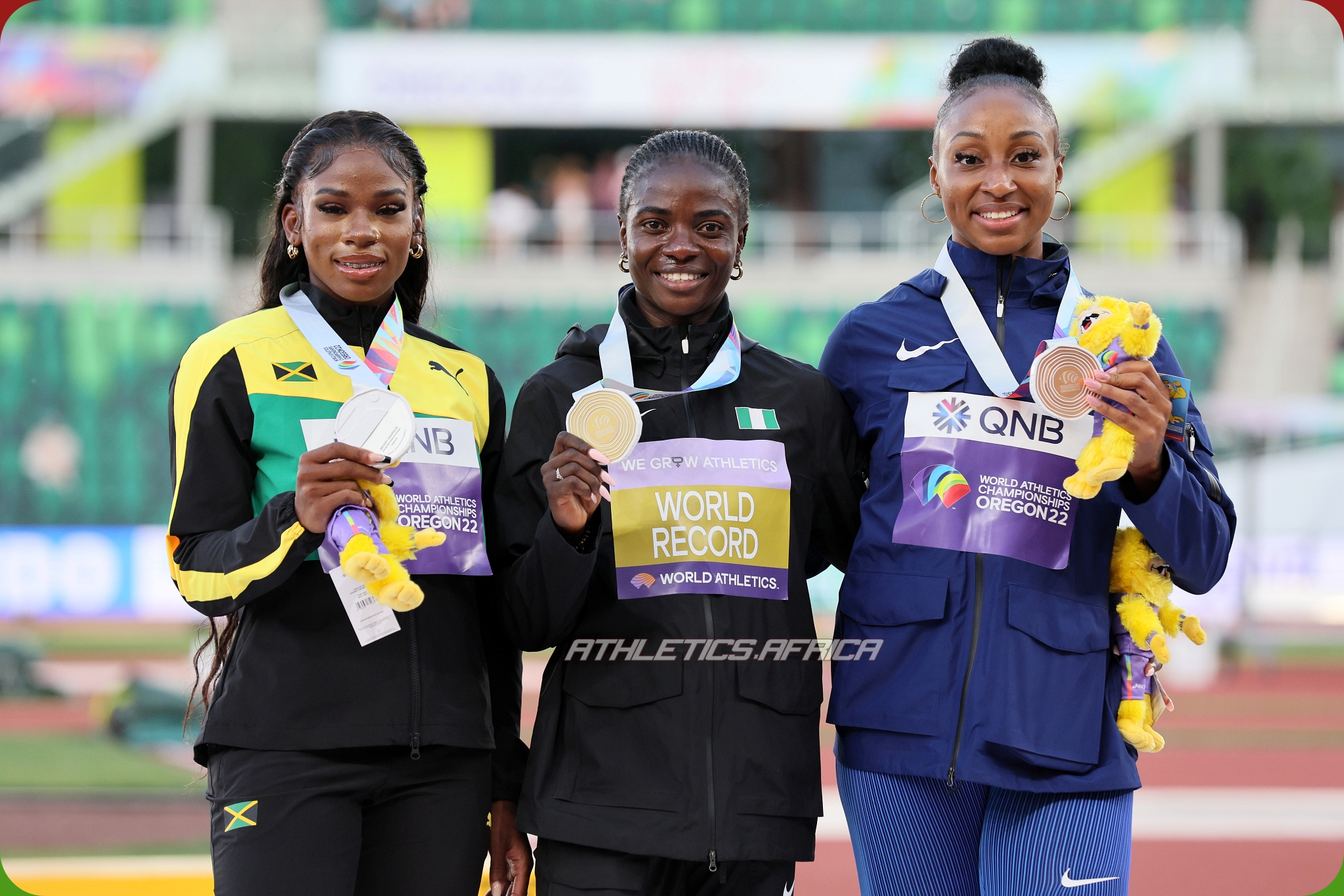 Silver medalist Britany Anderson of Team Jamaica, gold medalist Tobi Amusan of Team Nigeria, and bronze medalist Jasmine Camacho-Quinn of Team Puerto Rico pose during the medal ceremony for the Women's 100m Hurdles on day ten of the World Athletics Championships Oregon22 at Hayward Field on July 24, 2022 in Eugene, Oregon. (Photo by Andy Lyons/Getty Images for World Athletics)