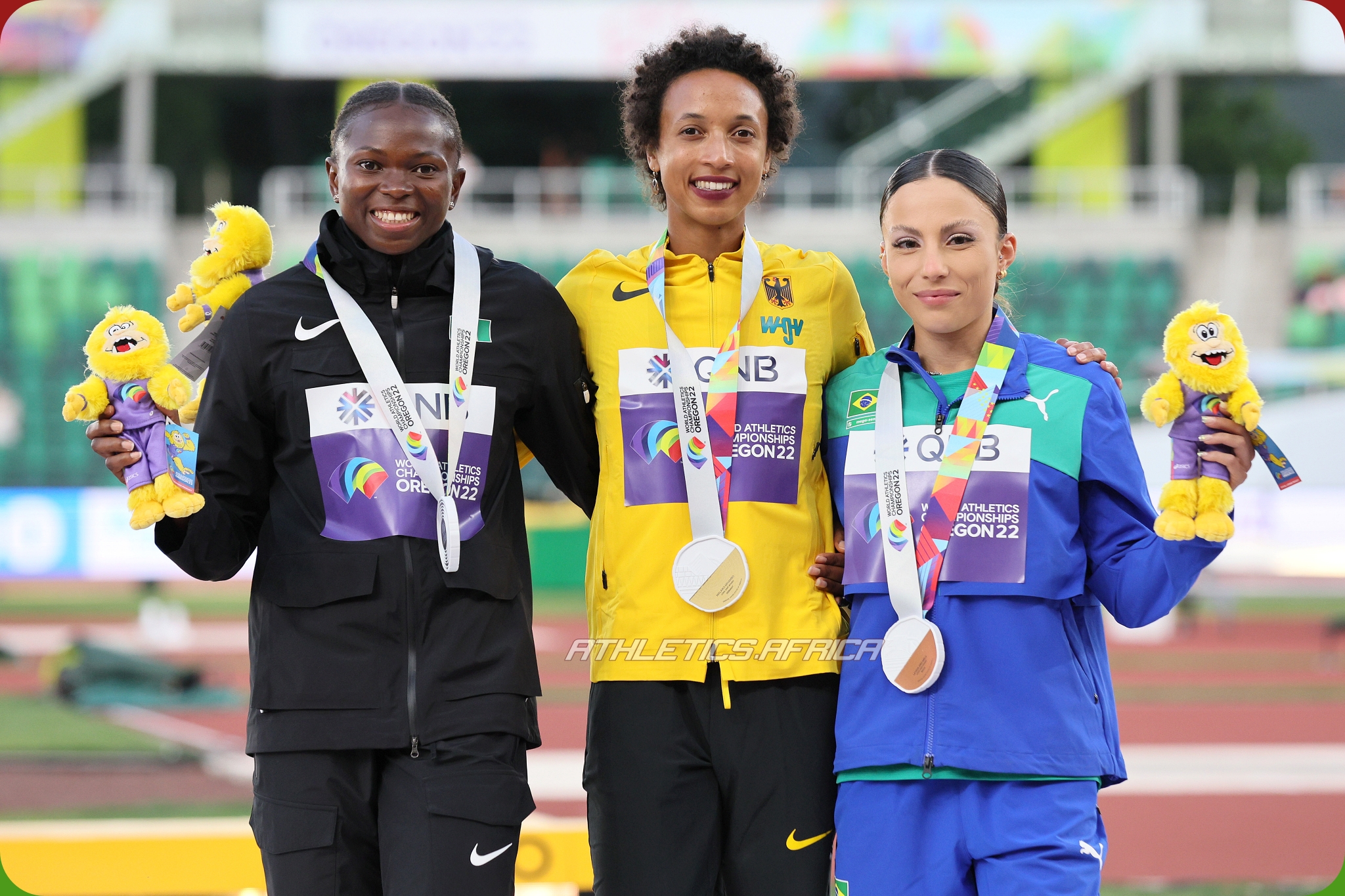 Silver medalist Ese Brume of Team Nigeria, gold medalist Malaika Mihambo of Team Germany, and bronze medalist Leticia Oro Melo of Team Brazil pose during the medal ceremony for the Women's Long Jump on day ten of the World Athletics Championships Oregon22 at Hayward Field on July 24, 2022 in Eugene, Oregon. (Photo by Andy Lyons/Getty Images for World Athletics)