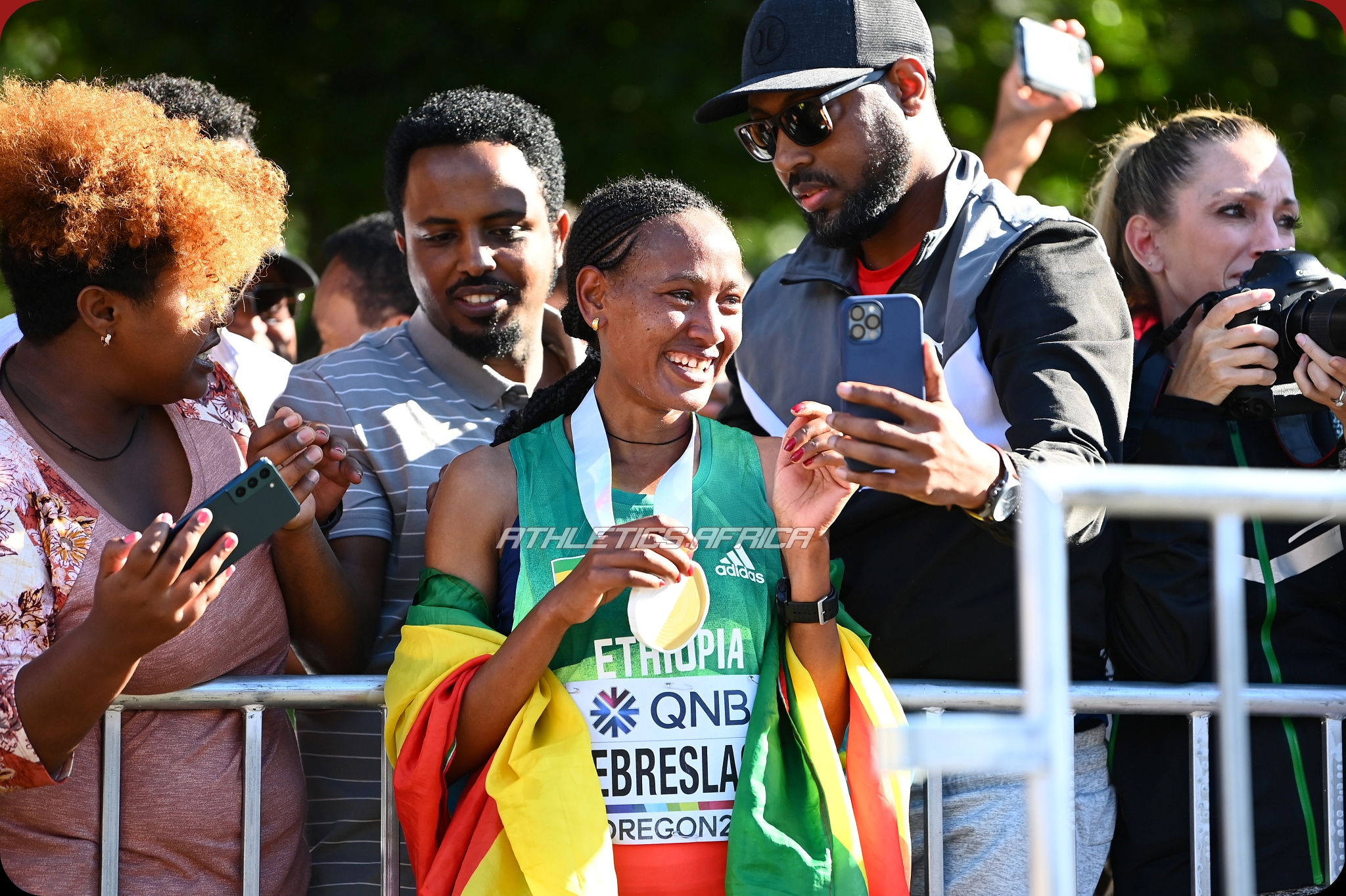EUGENE, OREGON - JULY 18: Gotytom Gebreslase of Team Ethiopia celebrates after winning gold in the Women's Marathon on day four of the World Athletics Championships Oregon22 at Hayward Field on July 18, 2022 in Eugene, Oregon. (Photo by Hannah Peters/Getty Images for World Athletics)