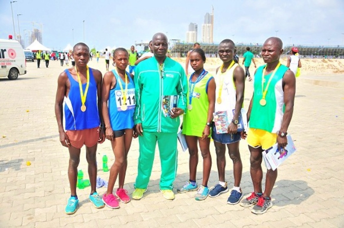 Coach Steve Nuhu with some of his athletes