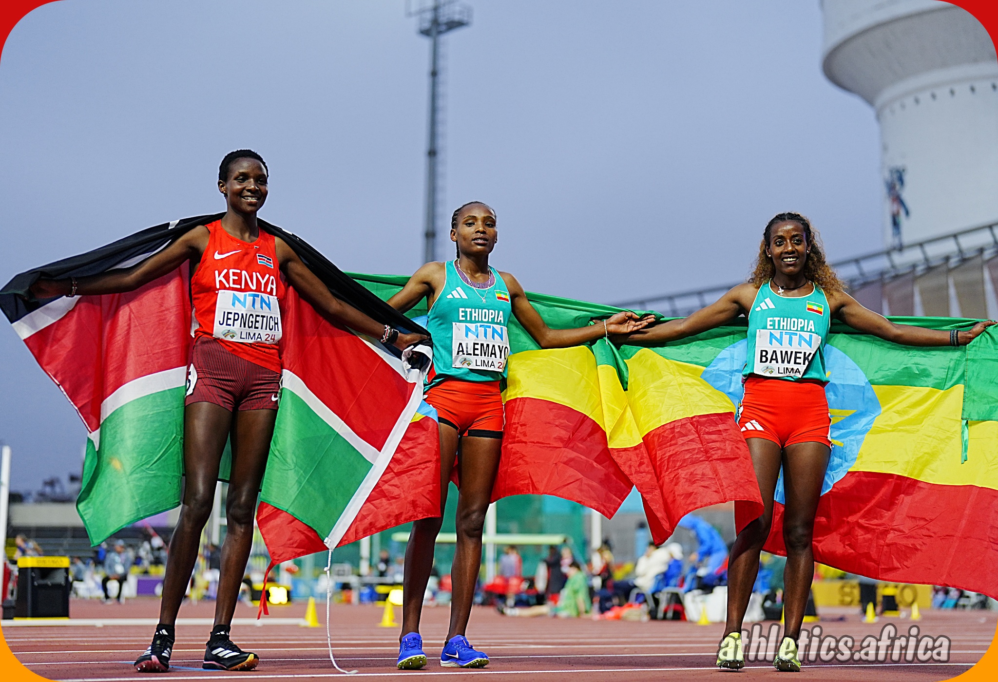 Ethiopia’s Aleshign Baweke with the women’s 3000m medallists at the World Athletics U20 Championships Estadio la Videna, Lima, Peru / Photo by Christel Saneh for World Athletics