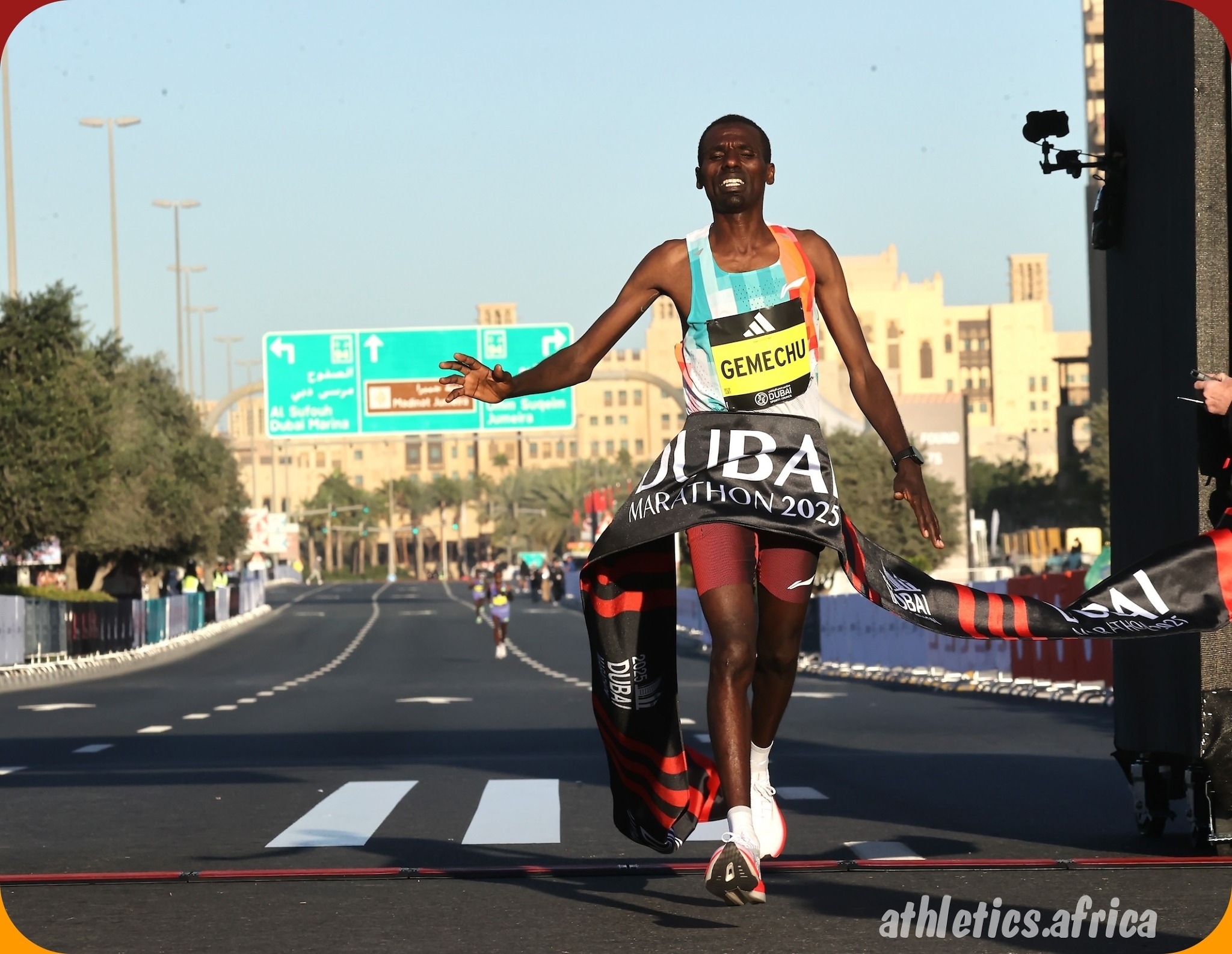Ethiopian Bute Gemechu celebrate his win at the 2025 Dubai Marathon / Photo credit: Giancarlo Colombo