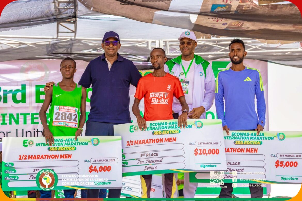 Harrison Muchira Wanjiru and other winners with NSC chairman Shehu Dikko at the 2025 ECOWAS Abuja International Half-marathon / Photo: Organisers