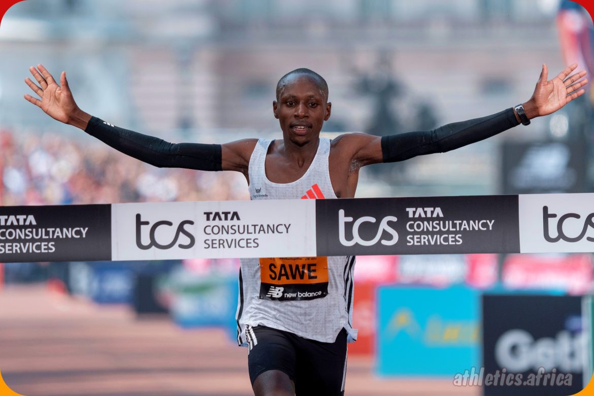 Sabastian Sawe (KEN) raises his arms as he crosses the finish line on The Mall to win the Men’s Elite race of The TCS London Marathon on Sunday 27 April 2025 / Photo credit: Bob Martin for London Marathon Events