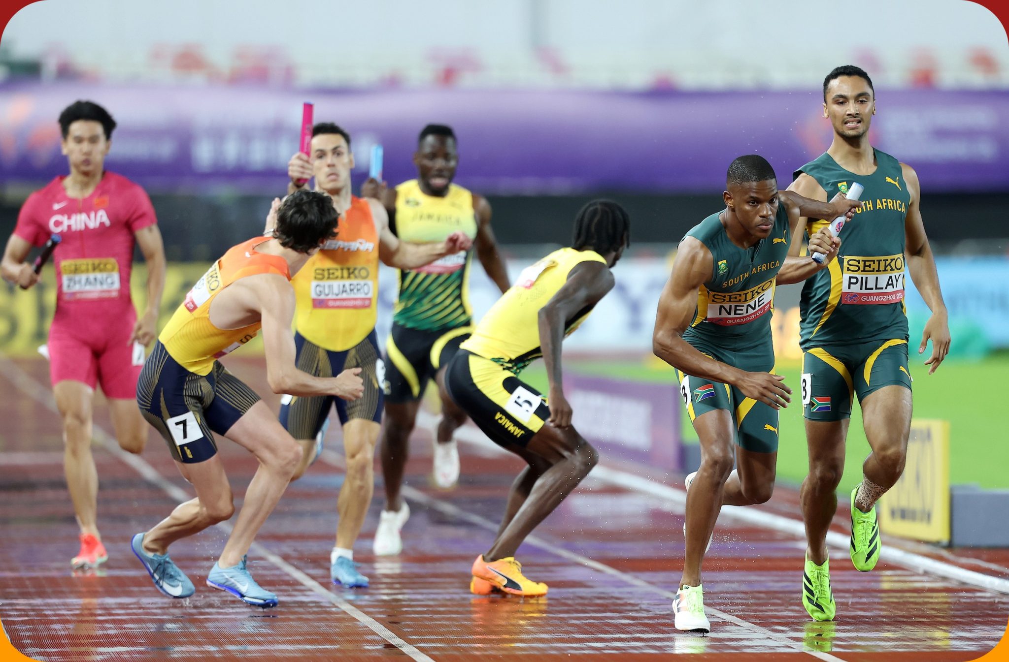 Zakithi Nene of Team South Africa collects the baton from Lythe Pillay of Team South Africa in the Men's 4x400 Metres Relay during day one of the World Athletics Relays Guangzhou 25 at Guangdong Olympic Stadium on May 10, 2025 in Guangzhou, China. (Photo by Lintao Zhang/Getty Images for World Athletics)