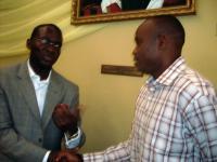 Lagos Governor, Raji Fashola congratulates Nigerian 2000 Olympics 4x400m relay gold medallist, Enefiok Udobong at the Sydney Bialosa Asiodu Foundation launch in Lagos - 25/03/2009 /Photo: Yomi Omogbeja